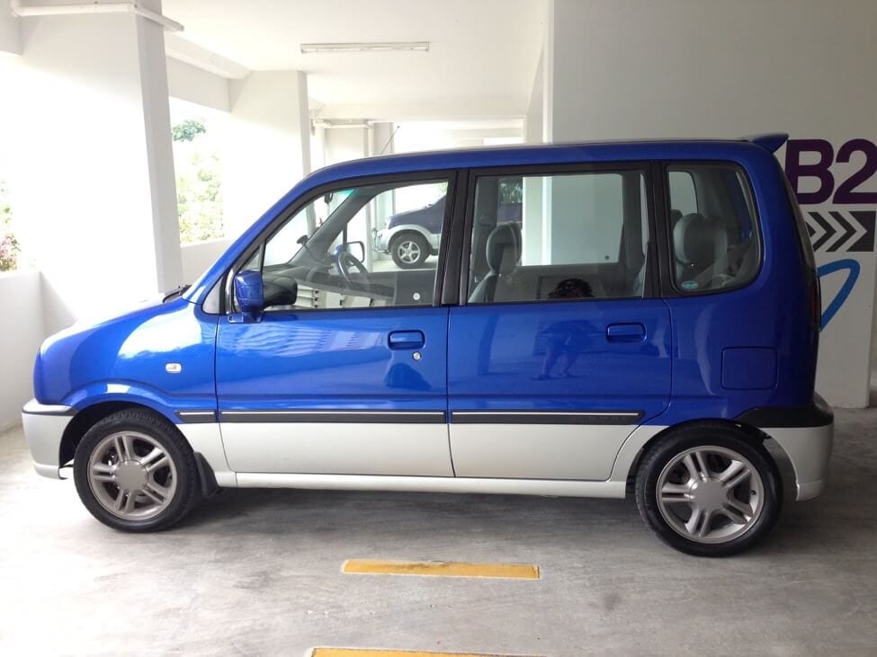 blue boxy car: cost of living in Penang 