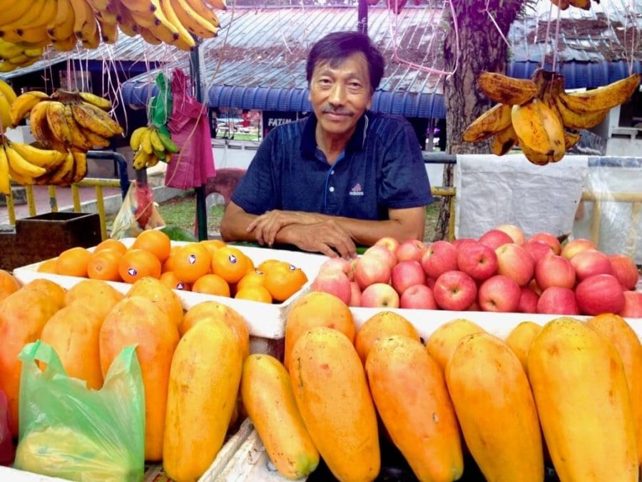 Our fruit man with all of his fruits