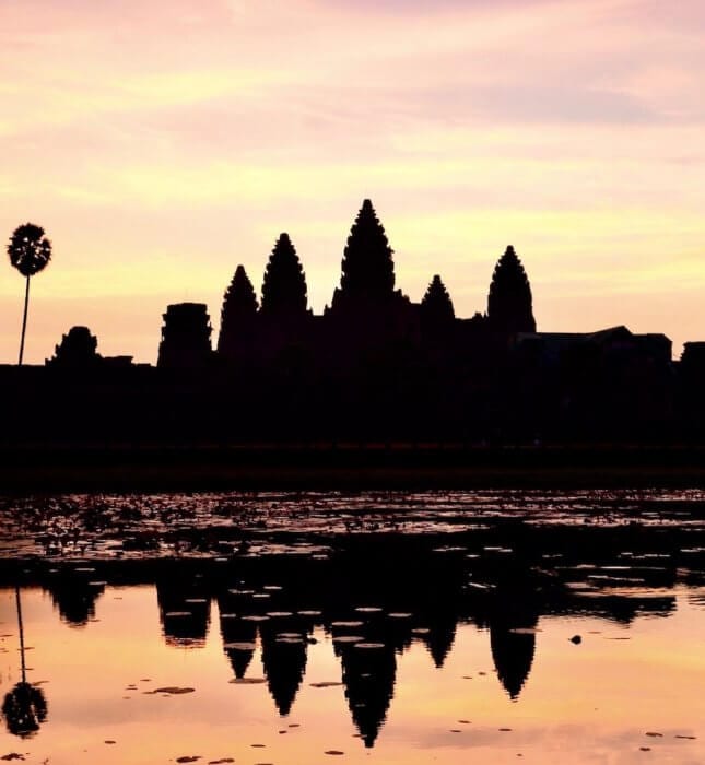 Angkor Wat at sunrise with reflection. must see places in Southeast Asia