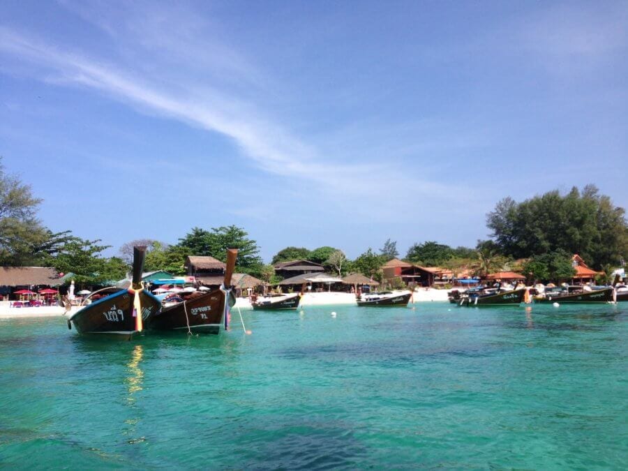 Thailand Lipe beach with boats must see places in Southeast Asia
