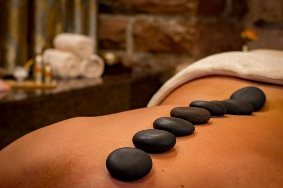 Hot stone massage, stones on spine