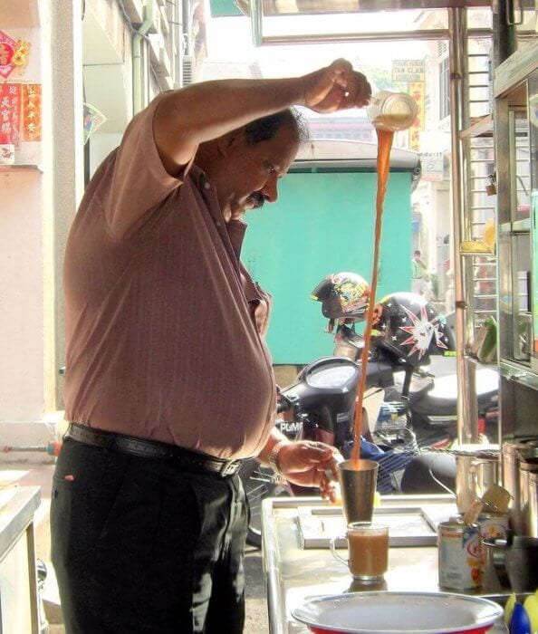 man pulling tea