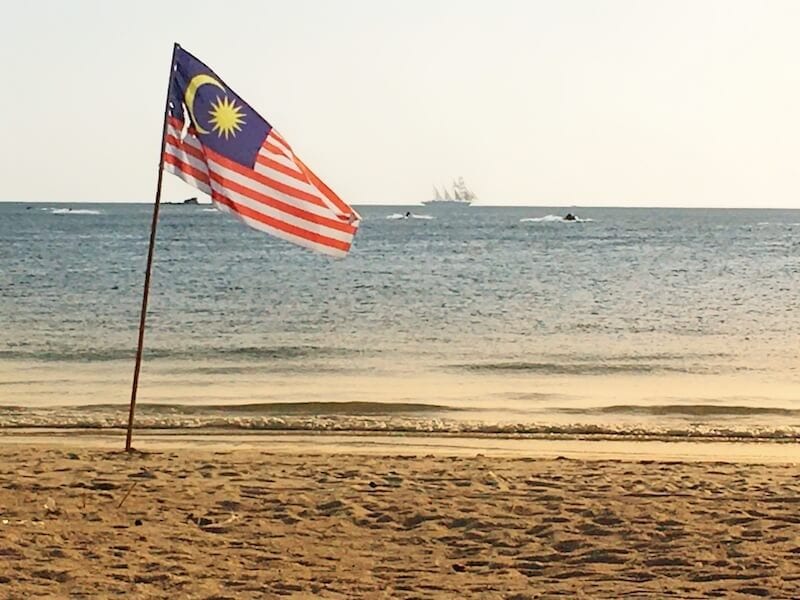 Malaysian flag on the beach 