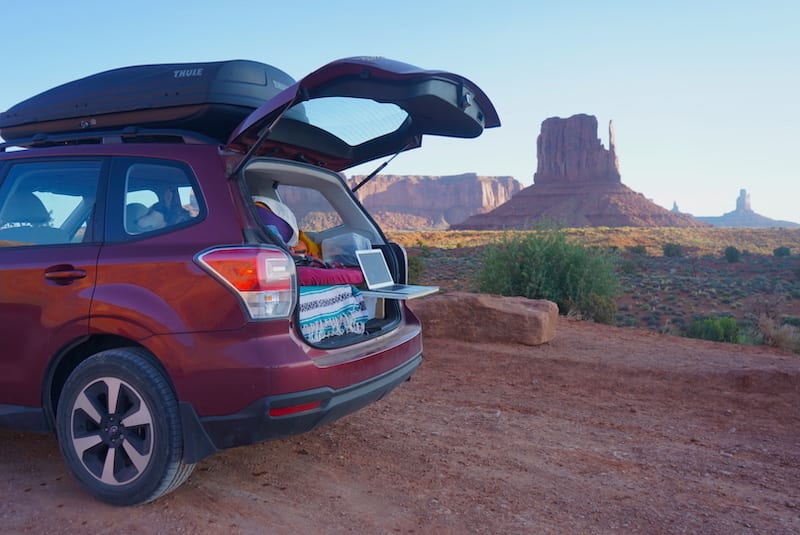 Car in front of Monument Valley Utah