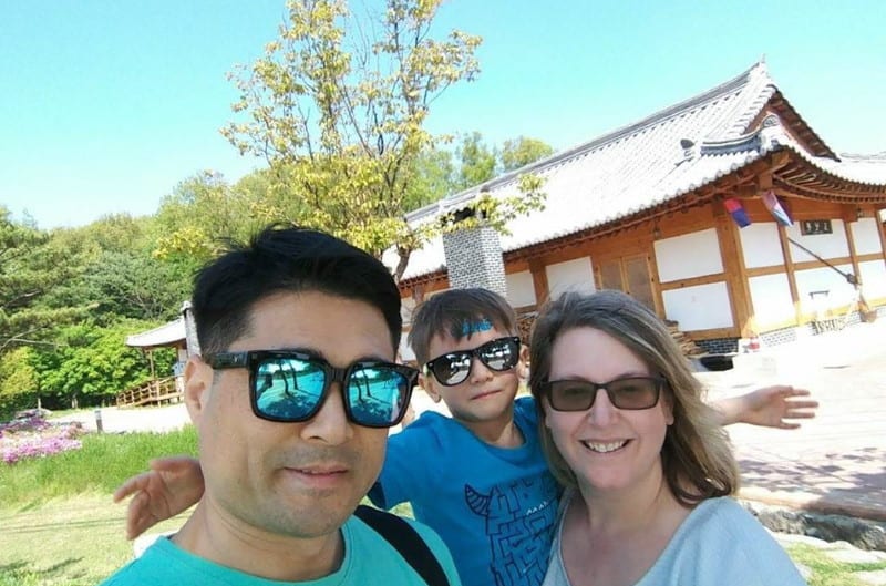 Husband, wife and child wearing shades: multicultural kids