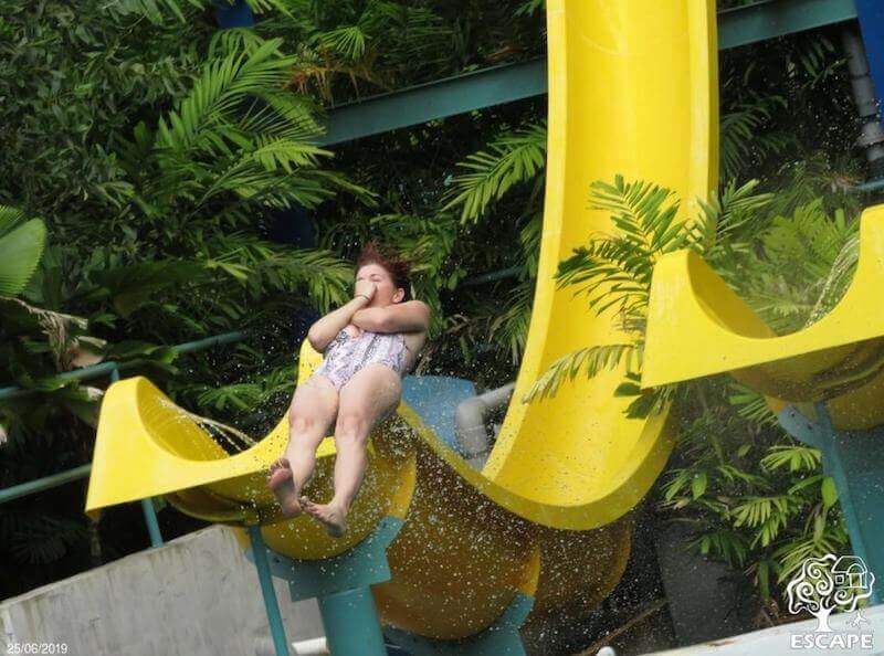 Me going off a yellow waterslide at Escape