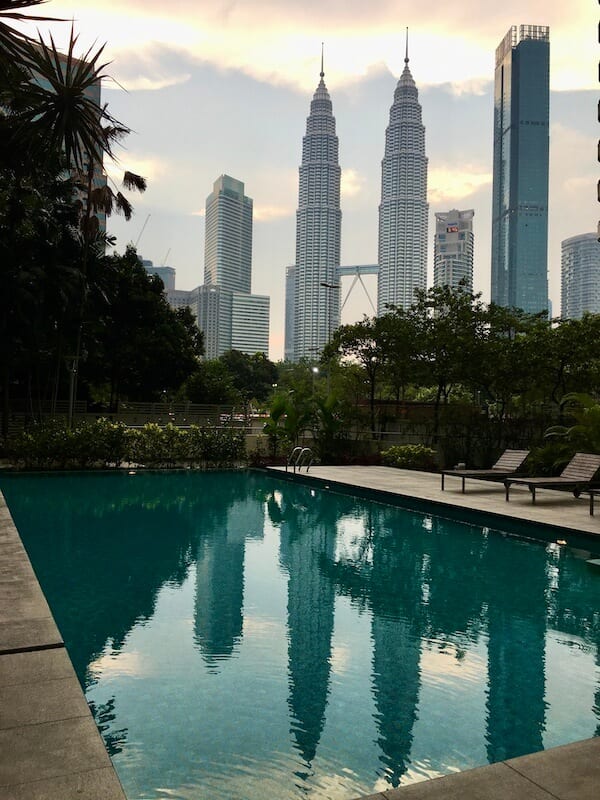KL Petronas Towers reflected in a pool