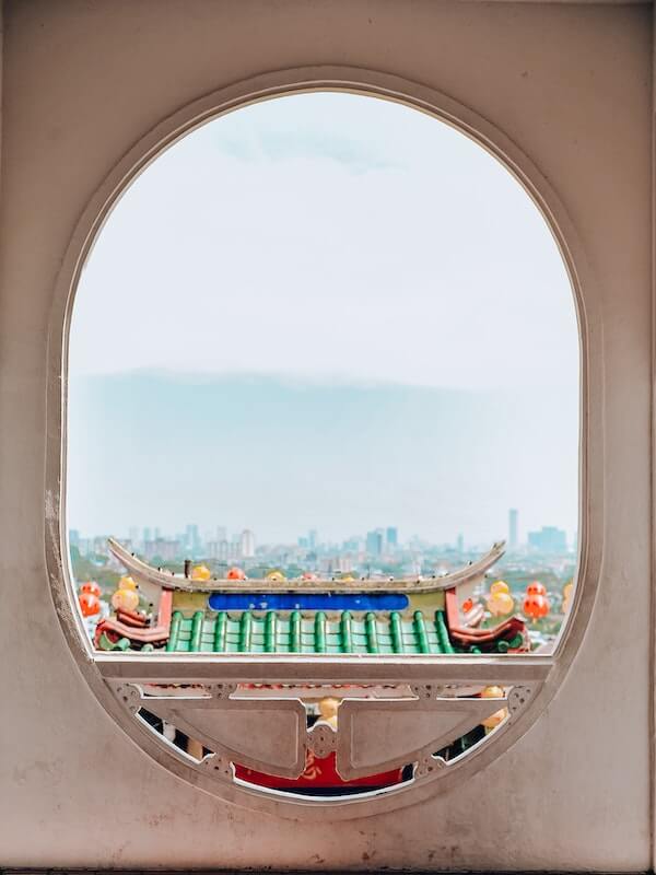 Kek Lok si through a oval window