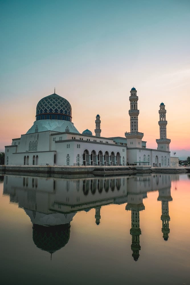 mosque on water with reflection: Kota Kinabalu Itinerary