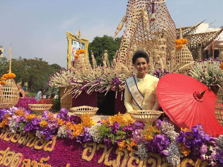 Girl in Chiang Mai on a float filled with flowers