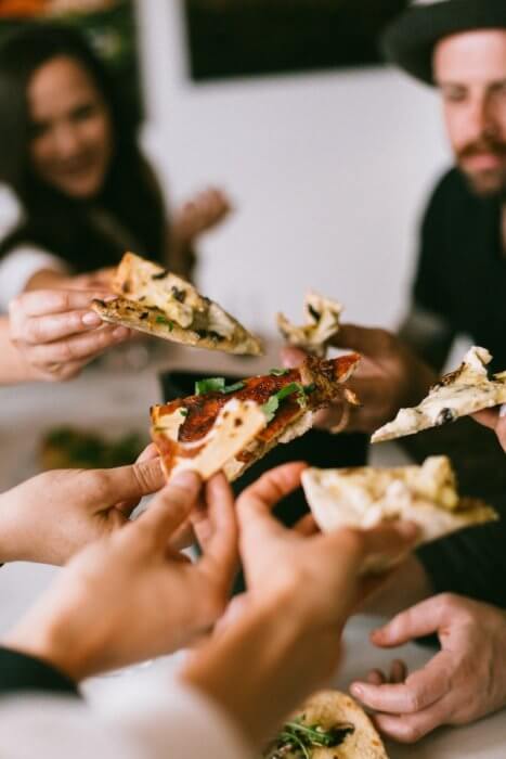 friends eating pizza : penang expats eating