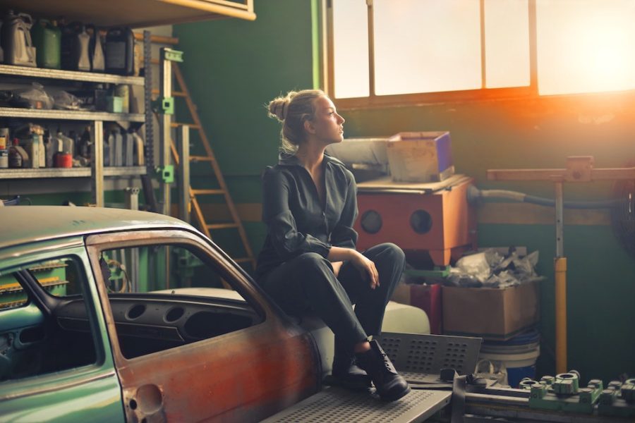 girl sitting in garage