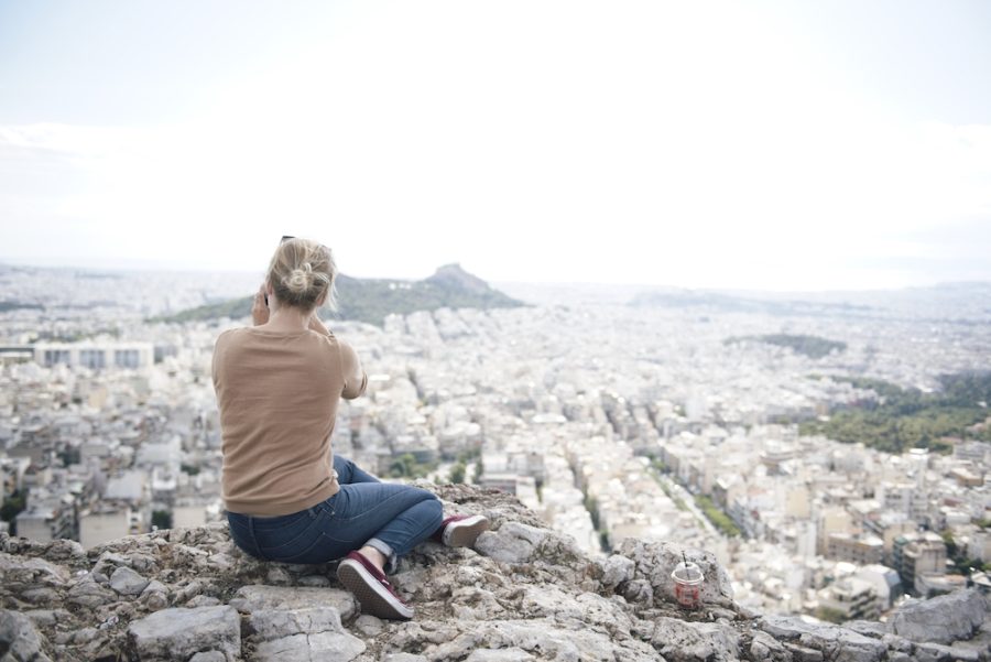 blonde girl overlooking the city