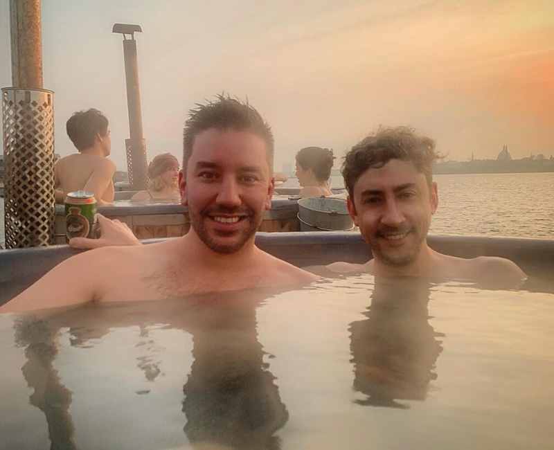 two guys in a hot tub in Copenhagen- expat in Denmark.
