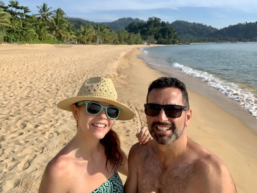 couple on deserted beach, tioman island  