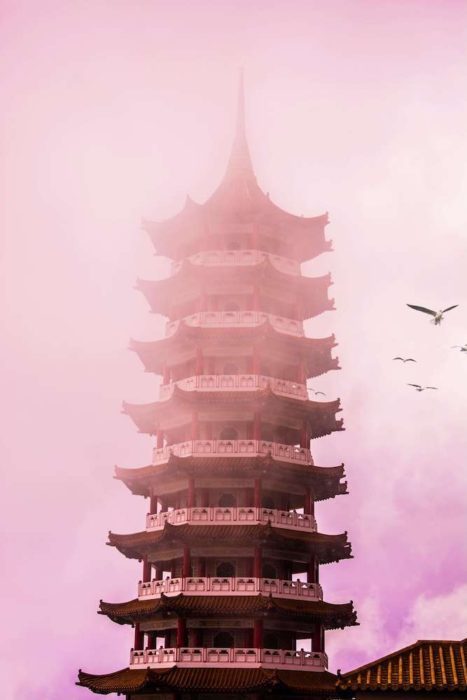 Chinese temple tower with pink skies