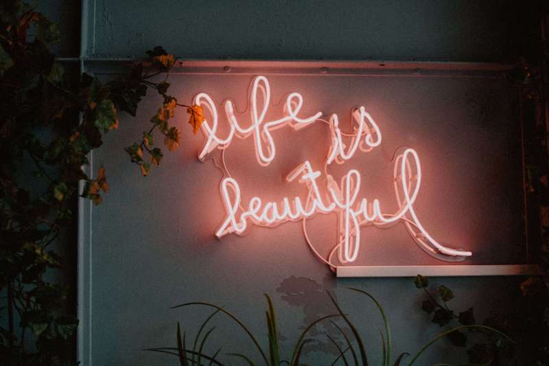 life is beautiful neon pink sign