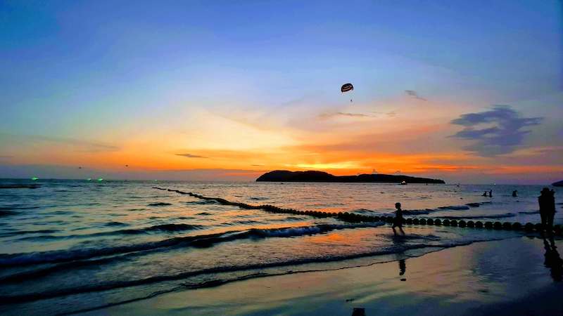 orange and blue sunset in Langkawi with parasail
