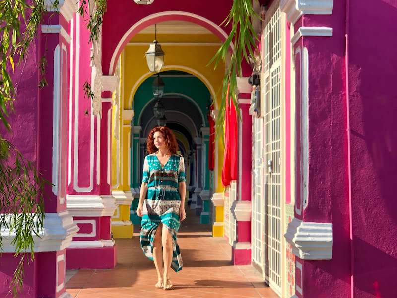 me in penang with colorful arches-best places to live in Malaysia