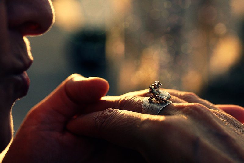 man kissing hand 