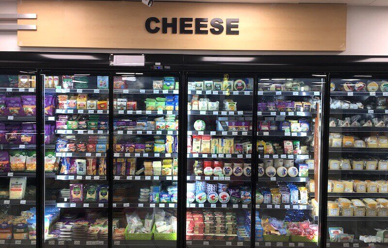 large cheese selection at a supermarket