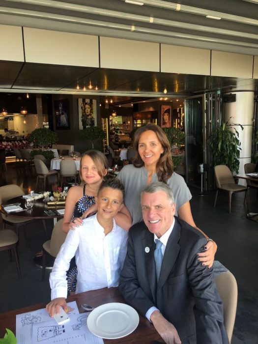 Mom and Dad and daughter and son dressed up at a restaurant, expat life in Abu Dhabi 