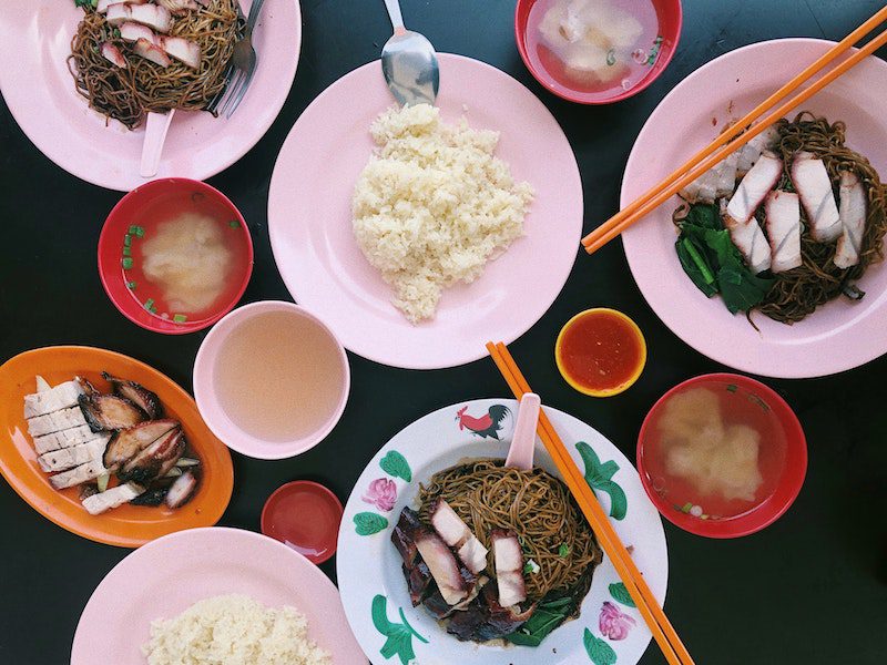 Malaysian food on pink plates