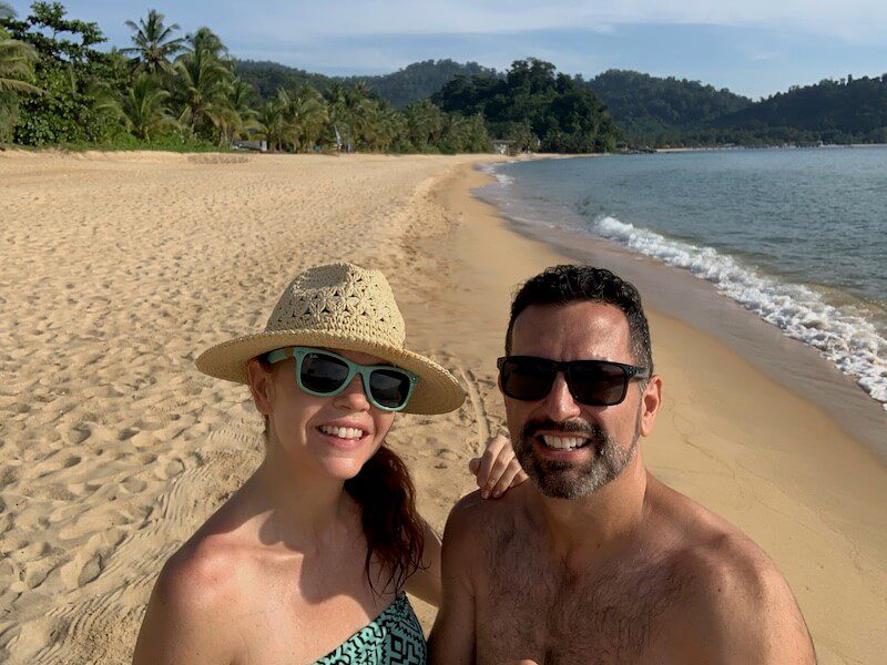 couple who live in Malaysia on a long deserted beach in Tioman.