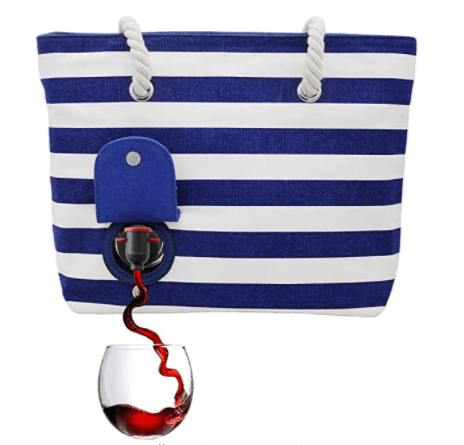 blue and white striped beach bag  that has a wine spigot. 