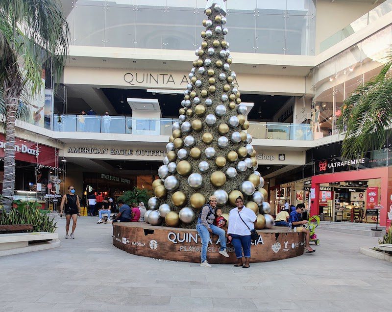 Christmas in Mexico, in front of a decorated tree