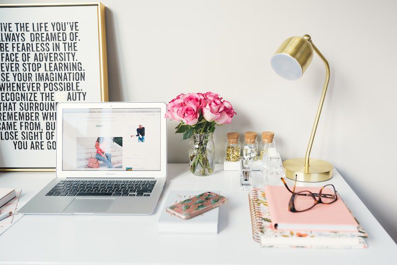 white desk with pink flowers and accents