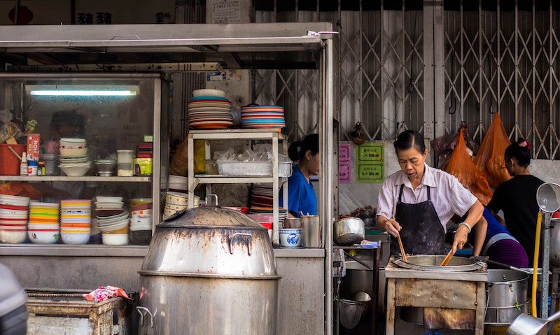 Man cooking on the street in Kuala Lumpur
