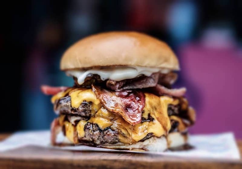 double cheese burger with bacon and gooey cheese