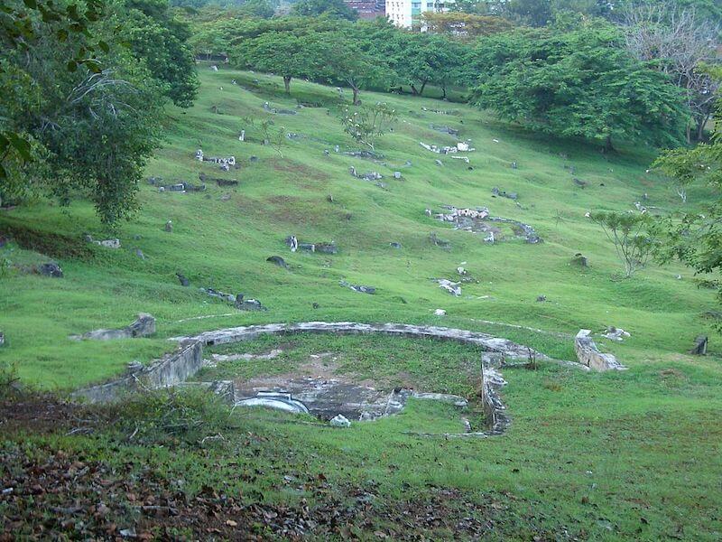 grass on a hill that is a cemetery in Malacca