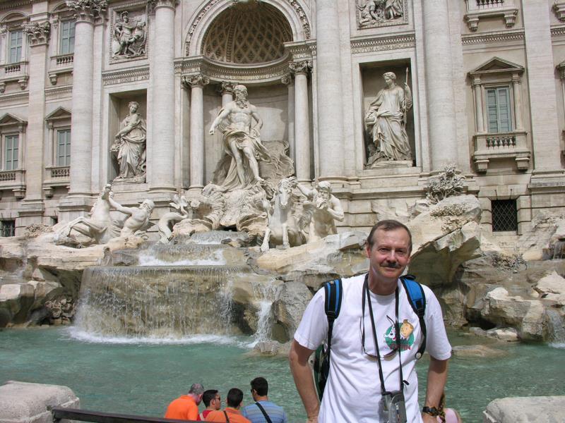 man in front of Trevi Fountain