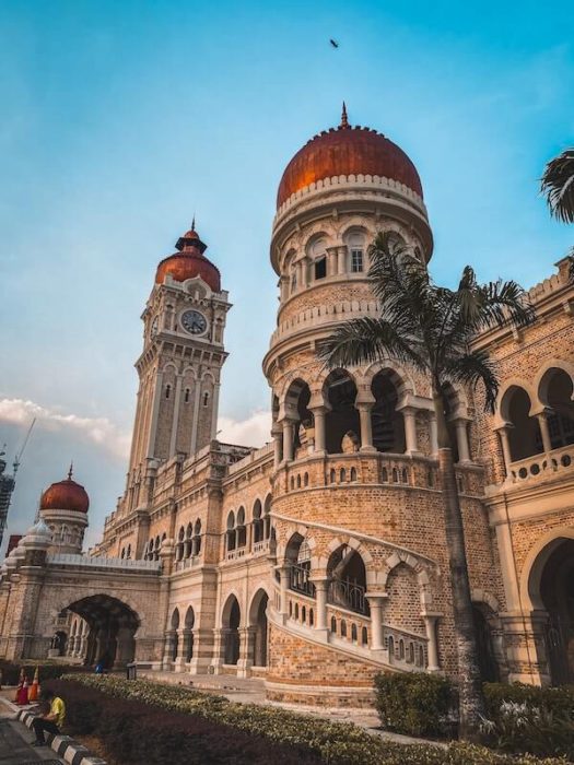 Historical building in Malaysia called the Sultan Abdul Samad building. It looks Moorish with lots of arches and copper domes.