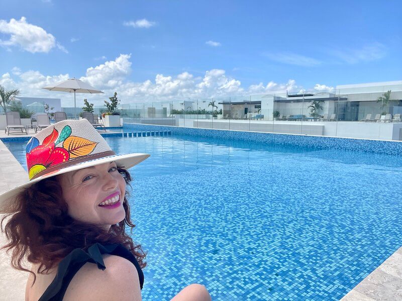 Me in a rooftop pool in Playa del Carmen, one of the best cities in Mexico