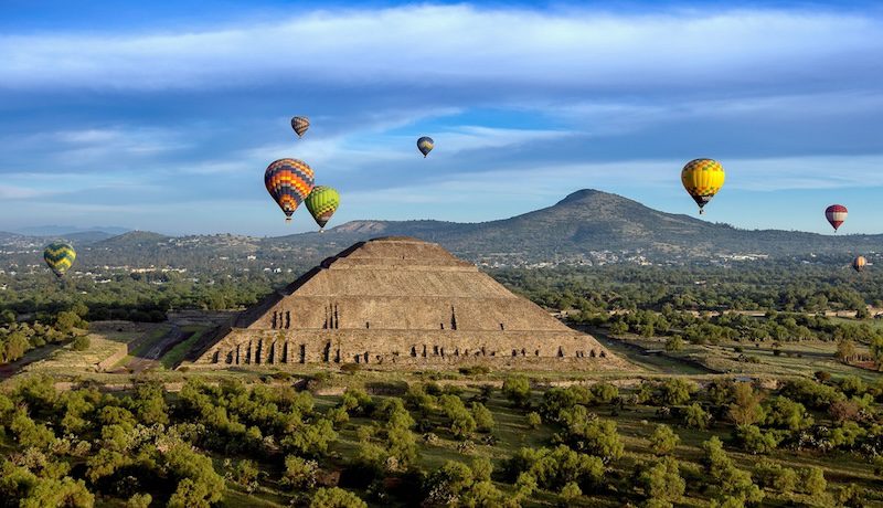 An aerial view of hot air balloons above the Teotihuacan pyramid in Mexico city