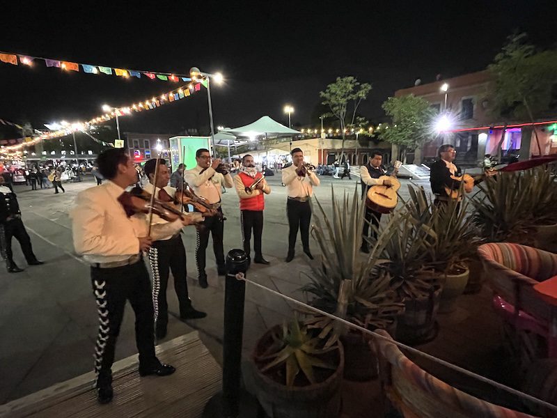 mariachis in white jackets in garibaldi square