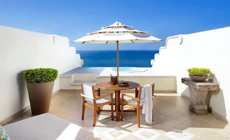 table and chairs with private hot tub overlooking the ocean at Grand Velas luxury hotel in Puerto Vallarta