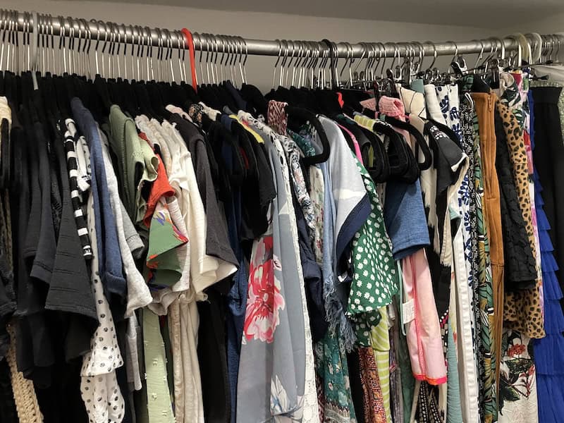 clothes hanging in a closet