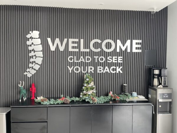 Sign at the back doctor in mexico. Welcome, Glad to see your back"