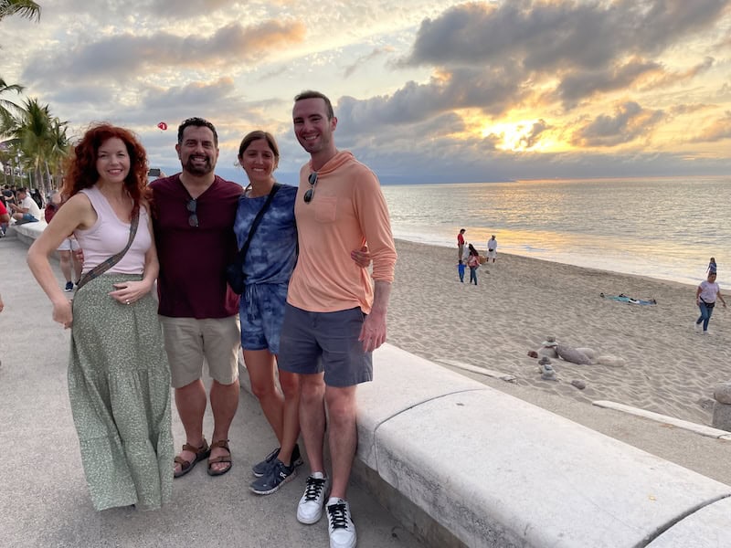 four people by the ocean in Puerto Vallarta