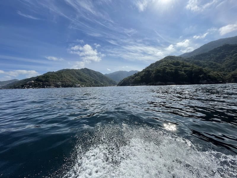 green hills view from the water in Puerto Vallarta