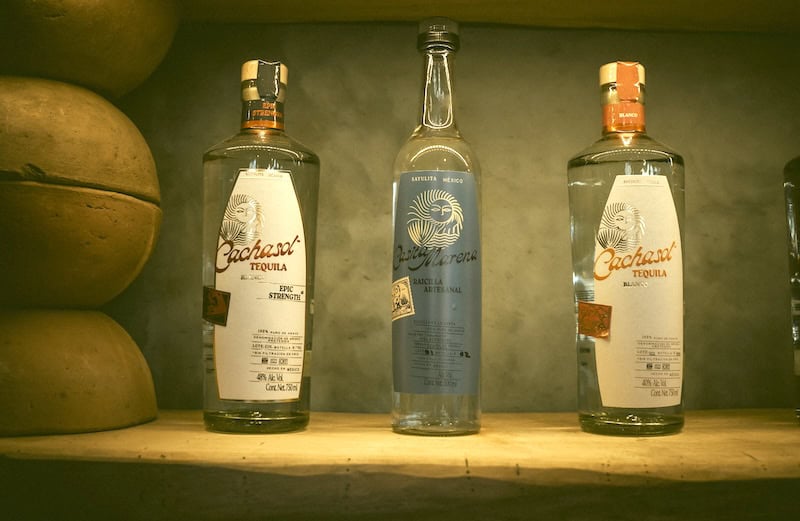 3 Cachasol bottles of tequila and raicilla