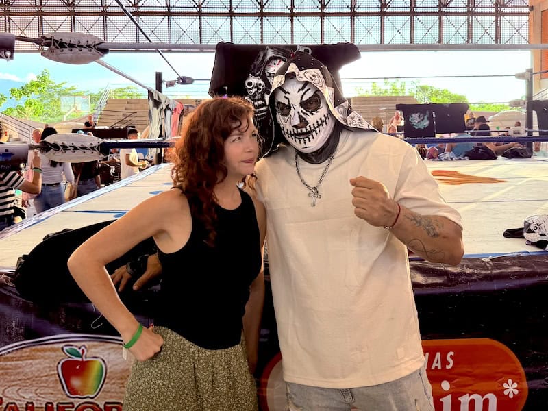 me and a luchador at a lucha libre wrestling match in Mexico