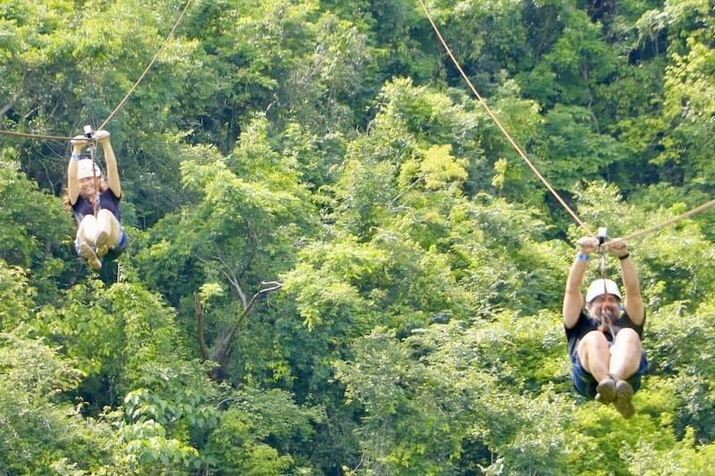 couple ziplines in the rainy season in Puerto Vallarta